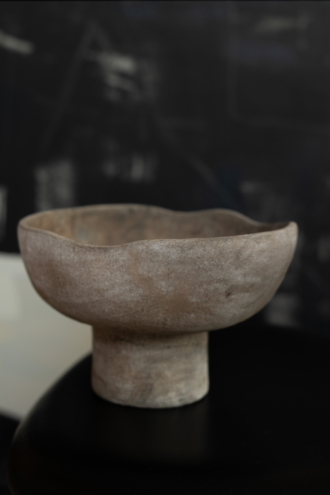 terracotta bowl with rounded walls.