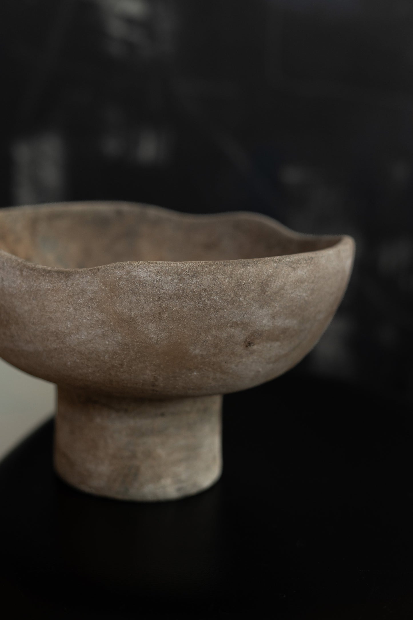 terracotta bowl with rounded walls.