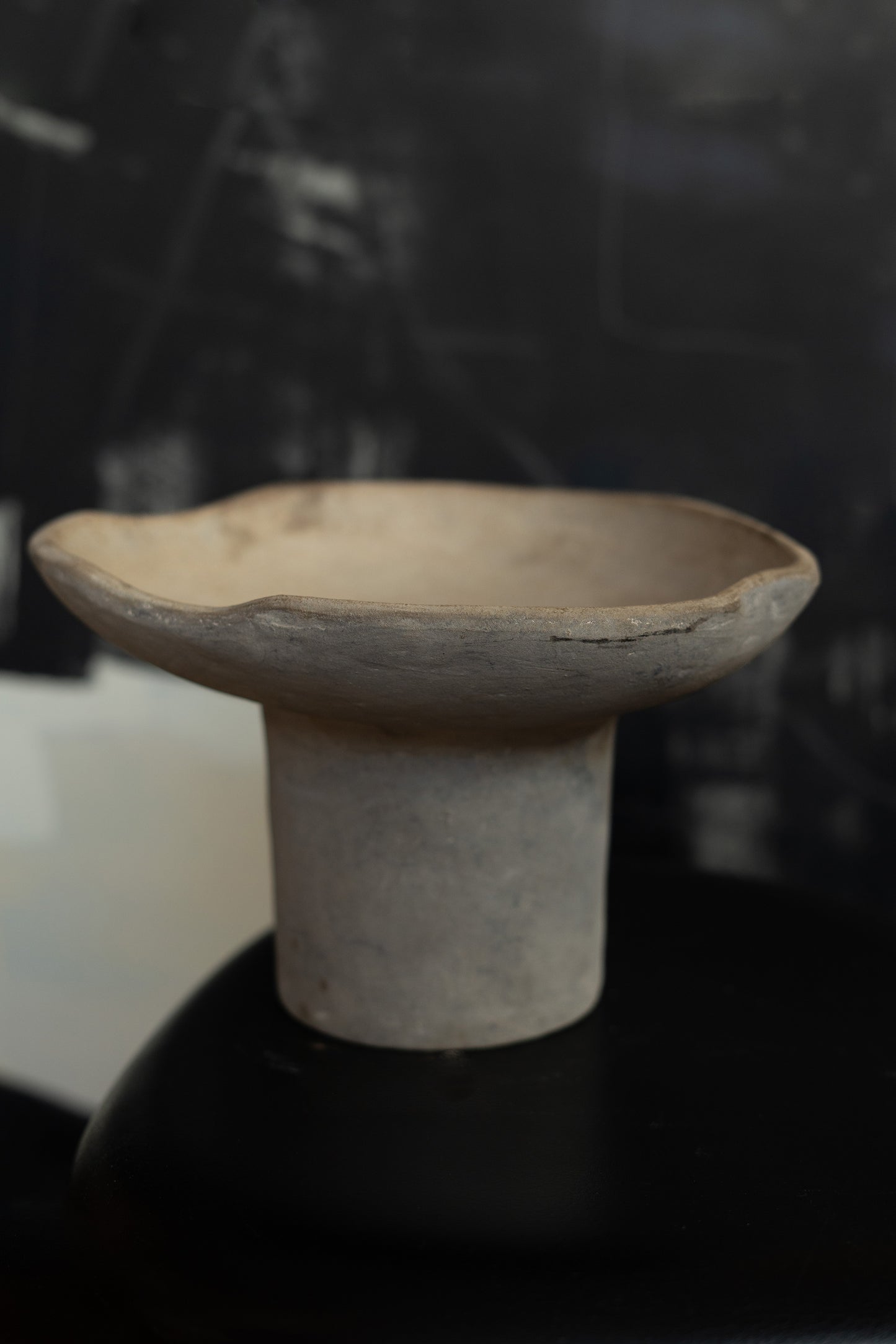 Terracotta pedestal bowl with a tall foot